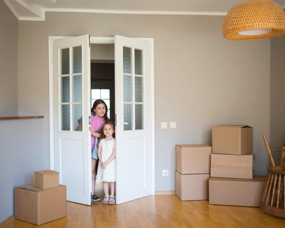 children-look-into-its-new-home-moving-to-apartment-boxes-in-house-1-1.jpg children-look-into-its-new-home-moving-to-apartment-boxes-in-house-1-1.jpg